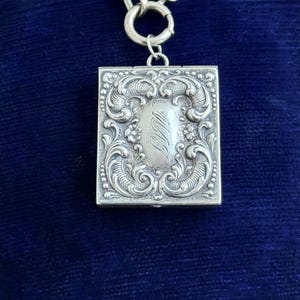 Victorian Sterling Silver Repousse Stamp Case