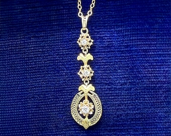 Edwardian 14k Two Tone Lavalier Diamond Buttercup Pendant