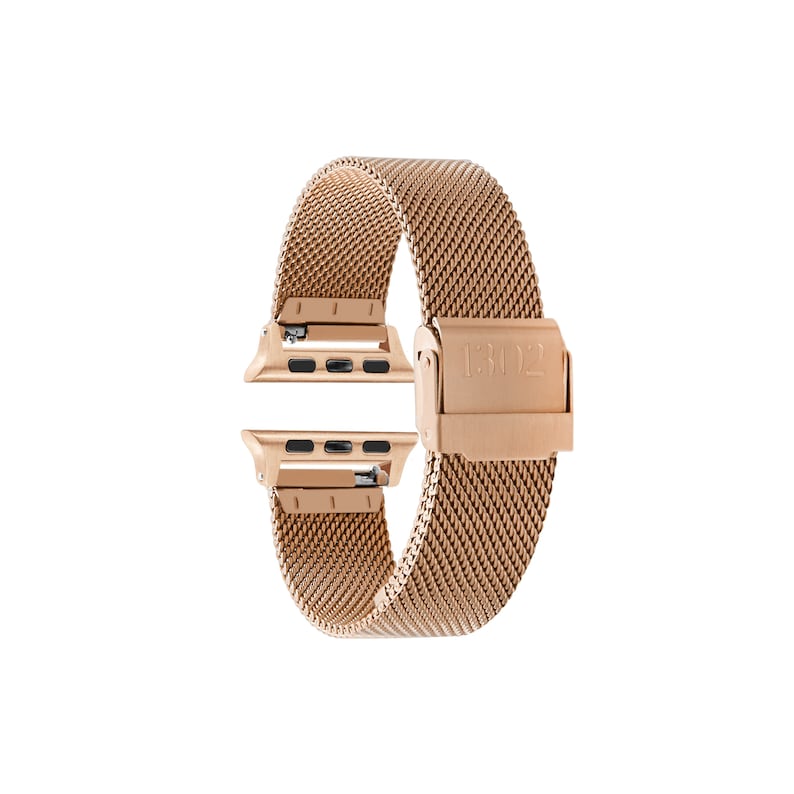 Puede incluir: Pulsera de reloj Apple de metal color oro rosa con dise&ntilde;o de malla y cierre que dice "1302".