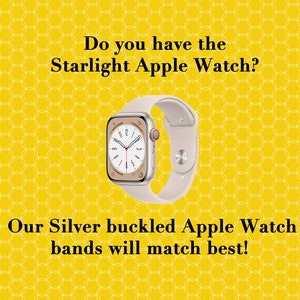 May include: A silver Apple Watch with a white band. The watch face is a white analog clock with black hands and numbers. The text on the image reads "Do you have the Starlight Apple Watch? Our Silver buckled Apple Watch bands will match best!"