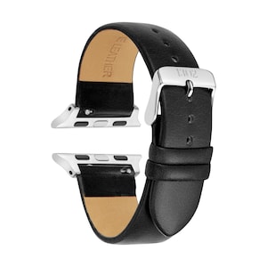 May include: A black leather watch band featuring silver-toned metal connectors and a silver buckle. The interior of the band is lined with tan leather and embossed with the text GENUINE LEATHER. The silver buckle is engraved with the text 1302.