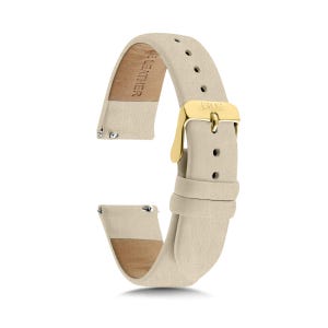 May include: A beige watch strap made of leather with a gold-toned metal buckle. The strap features a series of adjustment holes and a metal loop. The underside of the strap is embossed with the text GENUINE LEATHER, and the buckle is engraved with 1302.