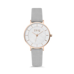 May include: A white analog wristwatch with a rose gold case and hands. The watch has a white leather band and a white face with a mother-of-pearl texture. The watch face has black Roman numeral hour markers and a small seconds hand. The watch face also has the text "1302" printed on it.