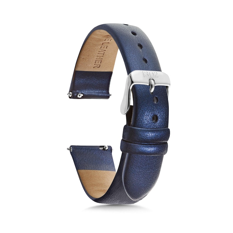 May include: A navy blue watch strap with a textured surface, featuring a silver-toned metal buckle and a light tan underside. The strap includes integrated spring bars for attachment and is embossed with the text GENUINE LEATHER on the inside.