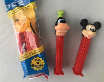 Disney Pez Dispensers, Pluto in packaging, Goofy, Mickey Mouse