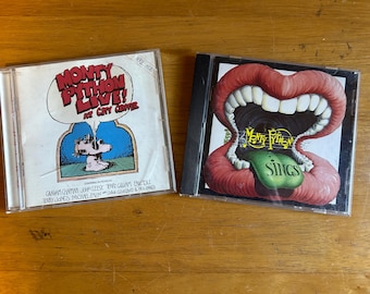 Monty Python CD's, Monty Python Live at City Center, Monty Python Sings, Surreal Sketch Comedy, Absurdist Humor, 1989, 1997