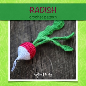 May include: A crocheted radish with a red and white bulb and green leaves. The radish is lying on a wooden surface. The text "RADISH crochet pattern" is displayed above the image.