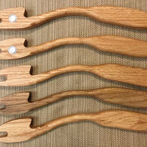 Oven rack pusher-puller with ergonomic design