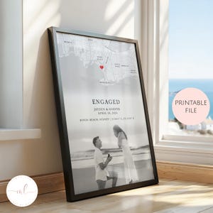 May include: A black framed print with a map of Bondi Beach, Sydney, marked with a red heart. The print reads "ENGAGED", the names "JAYDEN & HARPER", and the date "APRIL 10, 2024". A black and white photo of a proposal is at the bottom of the print.