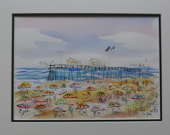 May include: Watercolor painting of a beach scene with a pier and colorful umbrellas. The pier has a few buildings on it and there are people sitting under the umbrellas on the beach.