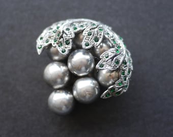 Vintage silver tone metal beaded leaf design dress clip with green rhinestones