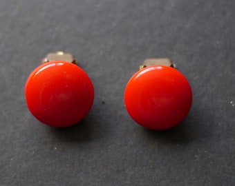 Bright red glass vintage clip on earrings circular shape