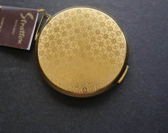 Vintage gold tone Stratton compact, engine turned pattern