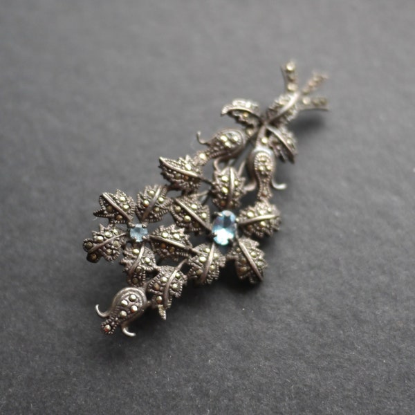 Vintage sterling silver 925  marcasite art deco flower brooch with blue stones