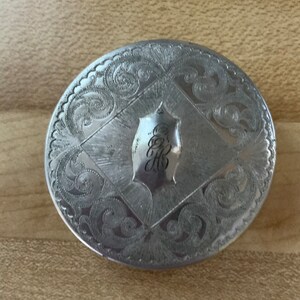 Compact with dial inside