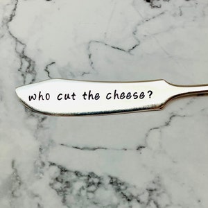 Who cut the cheese?  Cheese knife, fun spreader