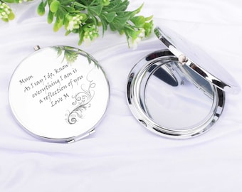 May include: A silver compact mirror with an engraved message that reads "Mum As I say I do, know everything I am is a reflection of you Love M".