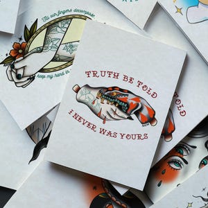 a collection of various tattoo designs, including a hand with a skull and crossbones, and a hand with a flower. The text on the image reads "TRUTH BE FOLD I NEVER WAS YOURS".
