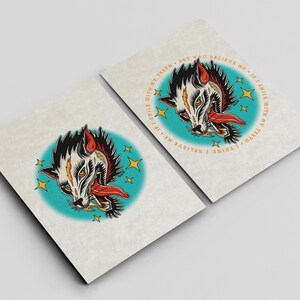 two identical cards with a stylized illustration of a wolf's head on a teal background.