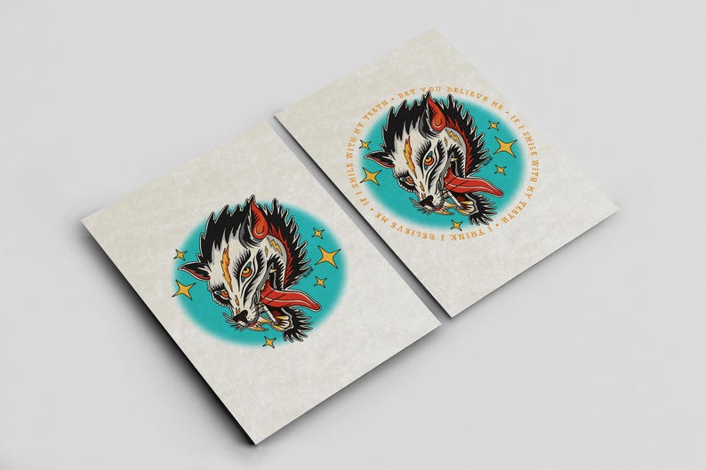 two identical cards with a stylized illustration of a wolf's head on a teal background.