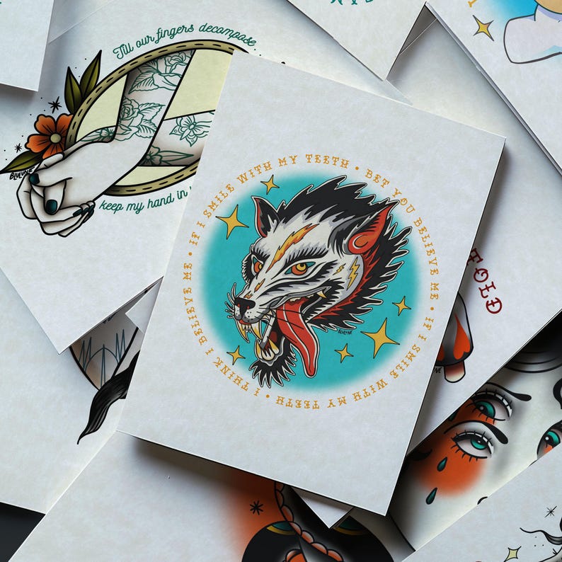 a collection of various tattoo designs, including a prominent illustration of a wolf's face with a quote around it.