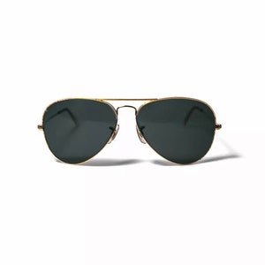 May include: Gold aviator sunglasses with dark green lenses.