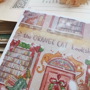 Carte postale - Librairie sous la neige - Noël - Librairie chat orange - Aquarelle - Cosy - Chien - Chat - Livres - Illustration personnelle image 6