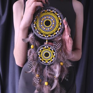 Gray Yellow Feather Dreamcatcher, Handmade Spiritual Wall Decor for Nursery or Bedroom, Nature-Inspired Wall Art, Ethnic Home Accent Gift