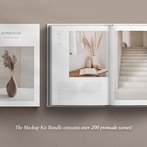 May include: A white book with the title "HOMESTAY by Naomi Hadar" on the cover. The book is open to reveal two pages with interior design photos. One page shows a white staircase and the other page shows a vase with dried flowers and a book on a table.