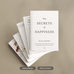 May include: A stack of five white books with the title "The Secrets of Happiness" by Eliza Ashton on the top book. The text "One of the hallmarks of Eliza Ashton books is the depth of characterization that breathes life into every character." is printed below the author's name.