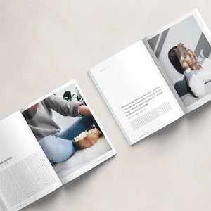 May include: An open magazine with a white background. The left page shows a woman sitting on a white rug with a bowl of popcorn in her lap. The right page shows a woman lying down with her head in her hands. The text on the right page reads "Without change there is no innovation, creativity, or incentive for improvement. Those who initiate change will have a better opportunity to manage the change that is inevitable."