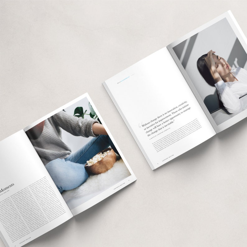 May include: An open magazine with a white background. The left page shows a woman sitting on a white rug with a bowl of popcorn in her lap. The right page shows a woman lying down with her head in her hands. The text on the right page reads "Without change there is no innovation, creativity, or incentive for improvement. Those who initiate change will have a better opportunity to manage the change that is inevitable."