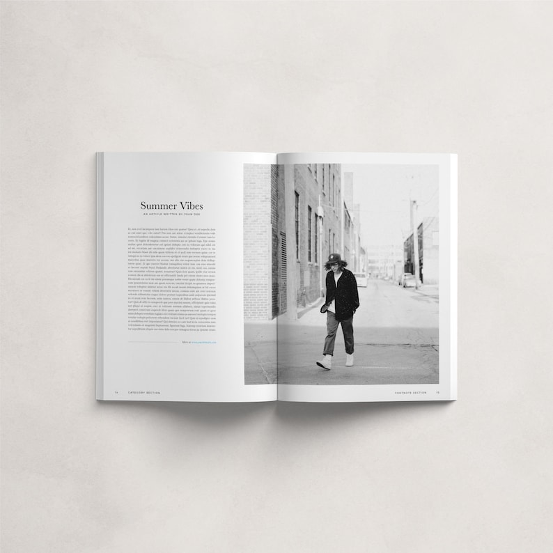 May include: A black and white photograph of a person wearing a black jacket, a hat, and jeans walking down a narrow alleyway. The photo is from a magazine spread titled "Summer Vibes".