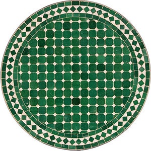 May include: A round green and white mosaic table top with a geometric pattern. The table top is made of small square tiles.