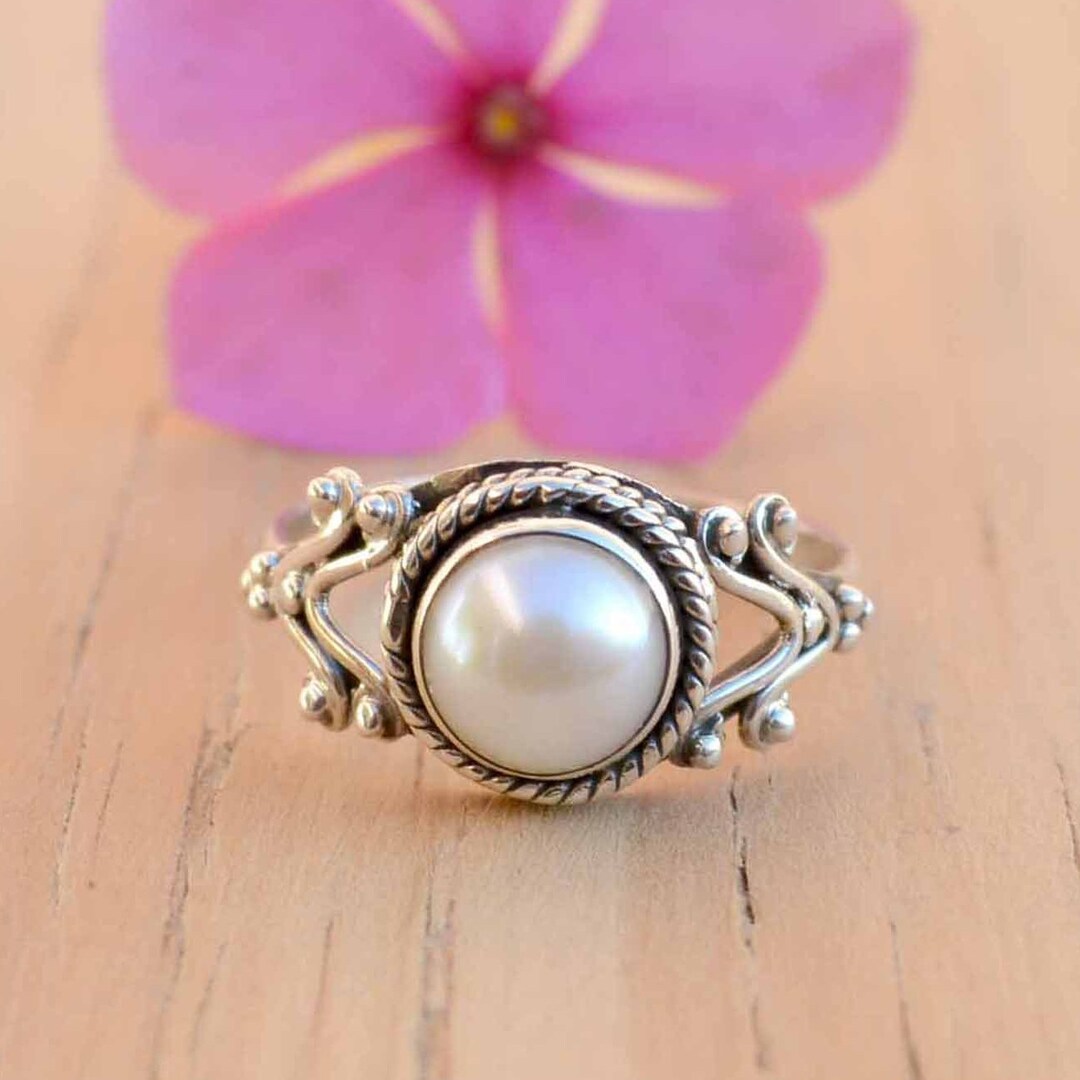 Silver ring with pearl stone discount