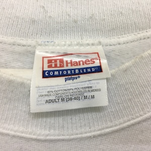 May include: White Hanes Comfortblend sweatshirt tag with the text "Hanes Comfortblend printpro 50% Cotton/50% Polyester USA Made Components Assembled in Mexico Care on Reverse Adult M (38-40)/M/M"
