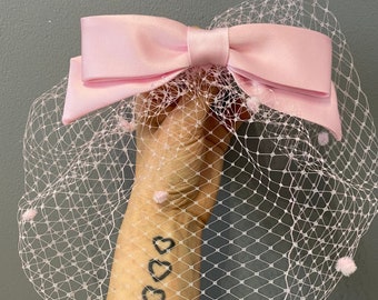 Pink satin bow birdcage veil