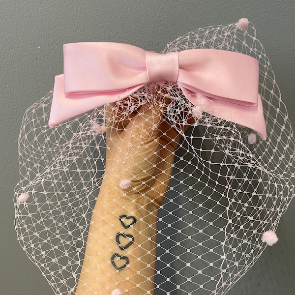 Pink satin bow birdcage veil