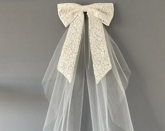 Lace bridal hair bow with veiling