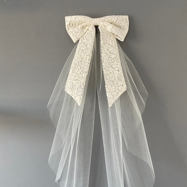 Lace bridal hair bow with veiling
