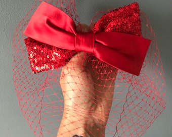 Red silk and sequin bow birdcage veil