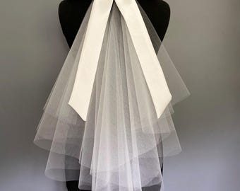 Narrow Ivory bridal hair bow in twill satin and option to add veiling