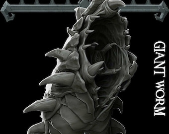 May include: A detailed, gray, 3D printed model of a giant worm with a large, open mouth and sharp teeth. The model is posed with its head raised and its body curled slightly. The text "GIANT WORM" is printed on the right side of the image.