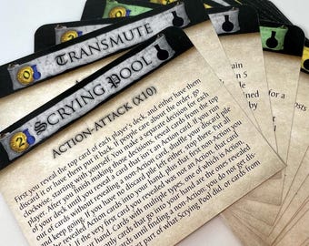 May include: A close-up of a card game with a brown background and gold accents. The card is titled "Scrying Pool" and has a description of the game's rules. The card is part of a larger set of cards.