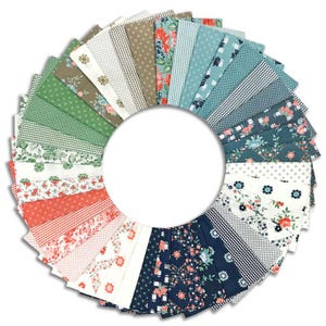 May include: A collection of 24 fabric squares in various floral patterns and colours, including blue, green, white, and coral. The squares are arranged in a circle, with the edges of the squares overlapping.