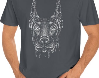 Puede incluir: Una camiseta gris antracita con un gráfico blanco de la cabeza de un Doberman.