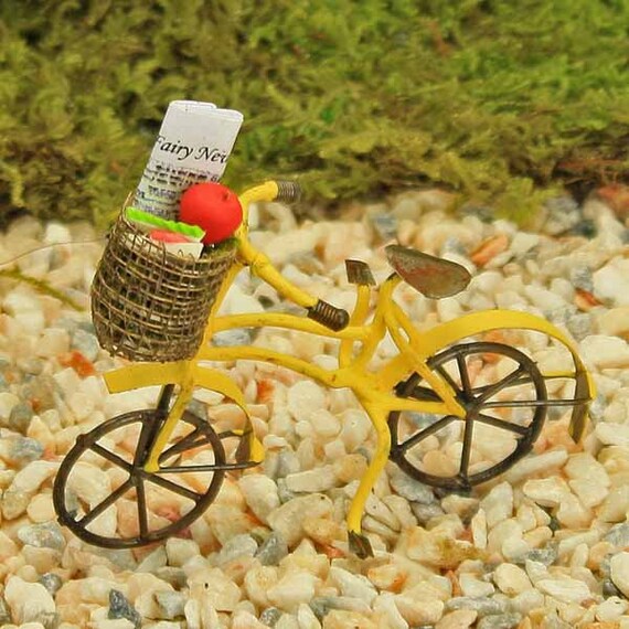 yellow bike with basket