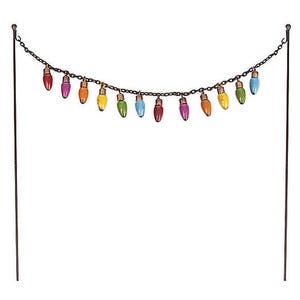 May include: A string of colorful miniature light bulbs hanging from a metal chain. The bulbs are red, orange, yellow, green, blue, purple, and pink. The chain is attached to two metal poles.