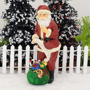 Traditionelle Weihnachtsfigur mit Spielzeugsack und frecher und schöner Liste, Feengarten Jahreszeitenaccessoire, Weihnachtsschmuck