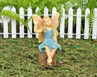 Fairy Harriet, Waving Fairy on Tree Stump, Miniature Waving Fairy Sitting on Tree Stump, The Fairy Garden UK